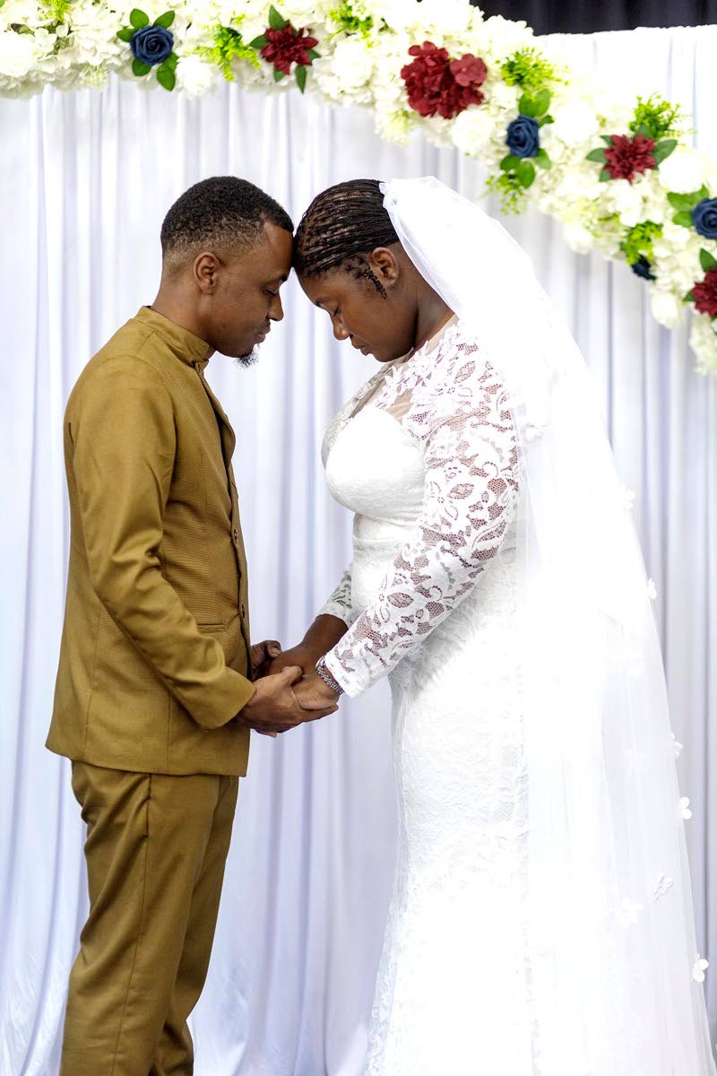 Hand in hand, Tadjé and Patrice Dixon find perfect harmony in each other.