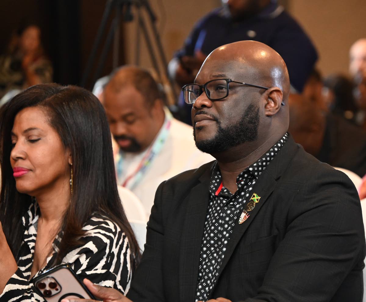 O'Brian Heron (right), president of the Jamaica Hotel and Tourist Association (JHTA), and Nicola Madden-Greig, chair of the Jamaica Product Exchange (JAPEX) Organising Committee, at the event held at Moon Palace Jamaica in St Ann on Monday.

