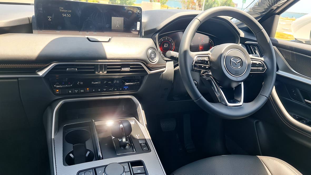 A side view highlighting the vehicle’s refined proportions and extended wheelbase.
