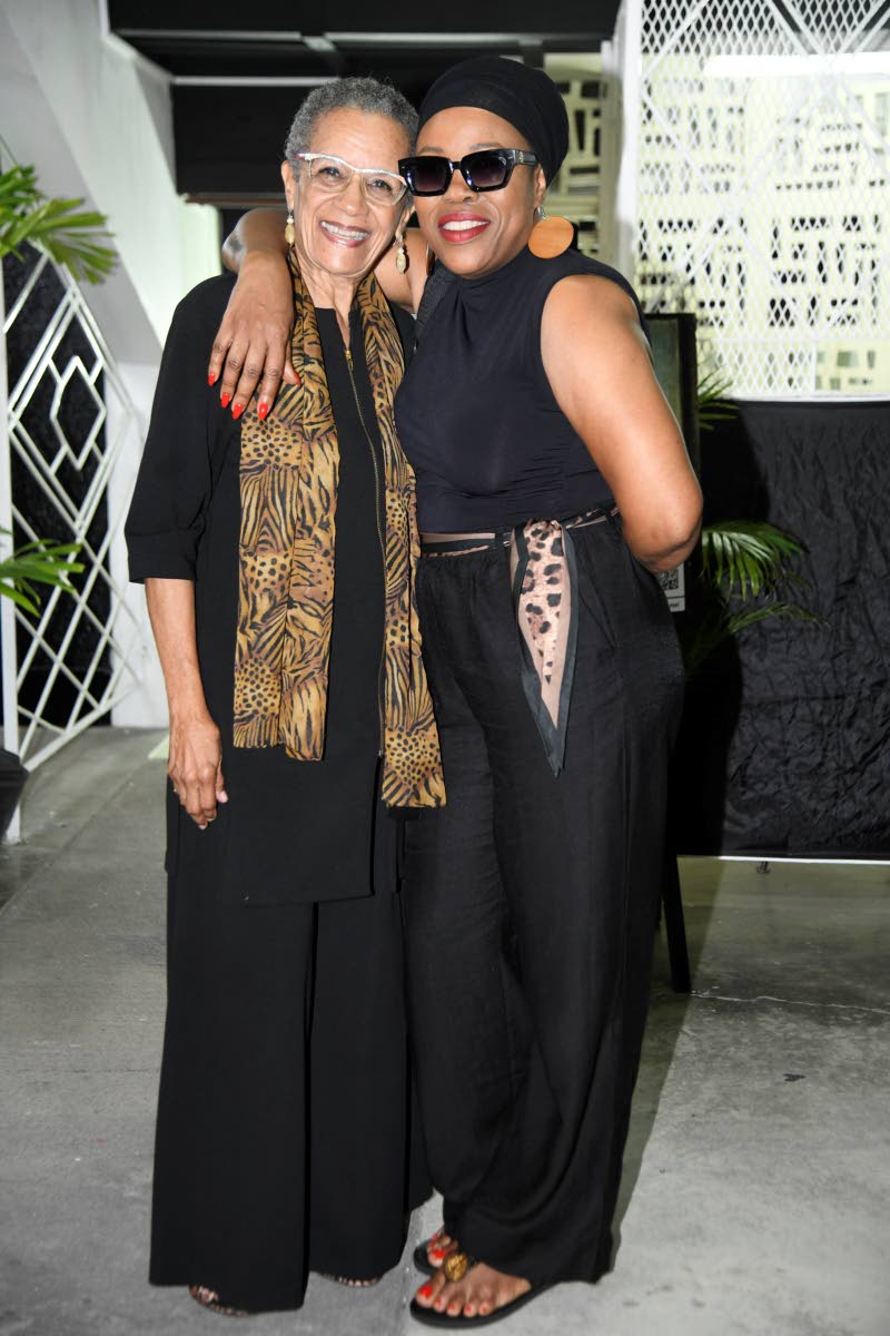 Veteran broadcaster Fae Ellington (left) shares the frame with Queen Ifrica at Sheldon Shepherd’s album listening event at the Philip Sherlock Centre for the Creative Arts at The University of the West Indies, Mona campus, on September 9. 