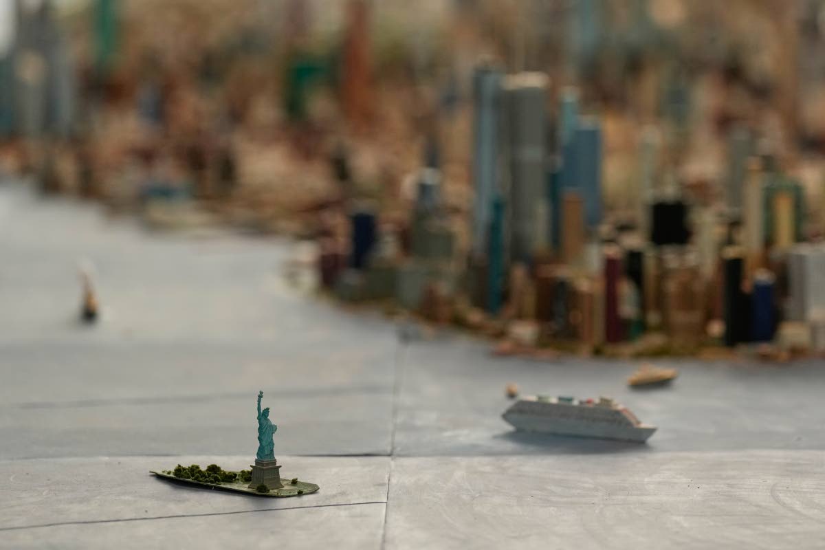 The Statue of Liberty is seen on a large model of the New York City, made by Joe Macken, at the Museum of the City of New York in New York.