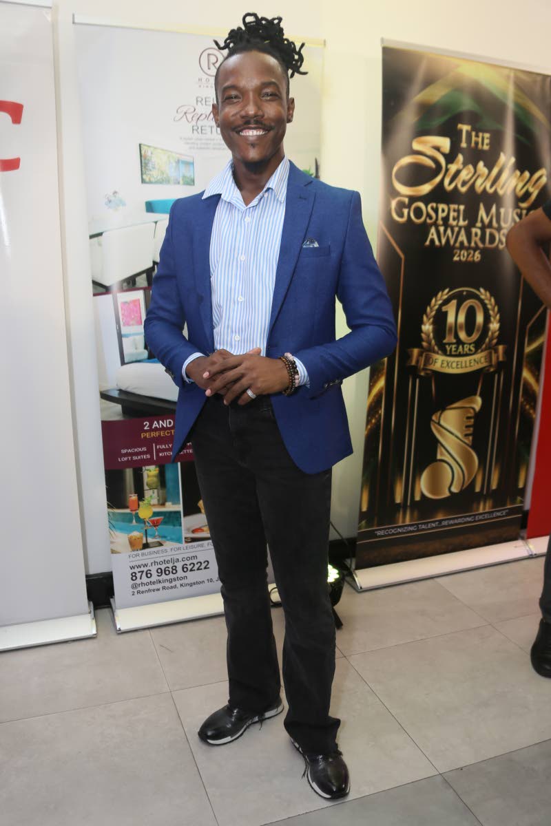Gerald A. Gordon, founder and chief executive officer, GAG Production, pairs a blue blazer with a striped shirt and black trousers.