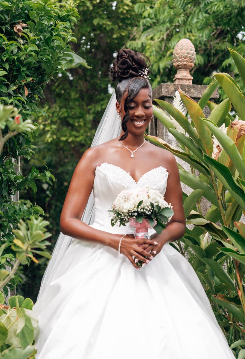 Mrs Clarke makes a stunning statement in a Cocomelody ballgown featuring a sweetheart neckline.