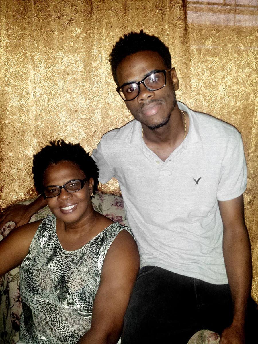 A young Mario Spencer is pictured with his mother, Cecilia Legister, whose support and hope he credits with helping him overcome osteosarcoma.
