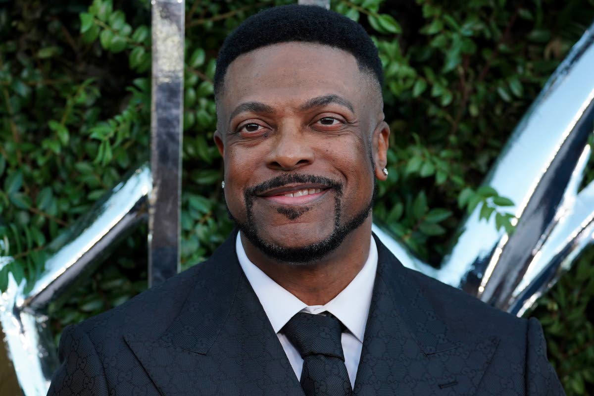 Actor and comedian Chris Tucker smiles for the lens.