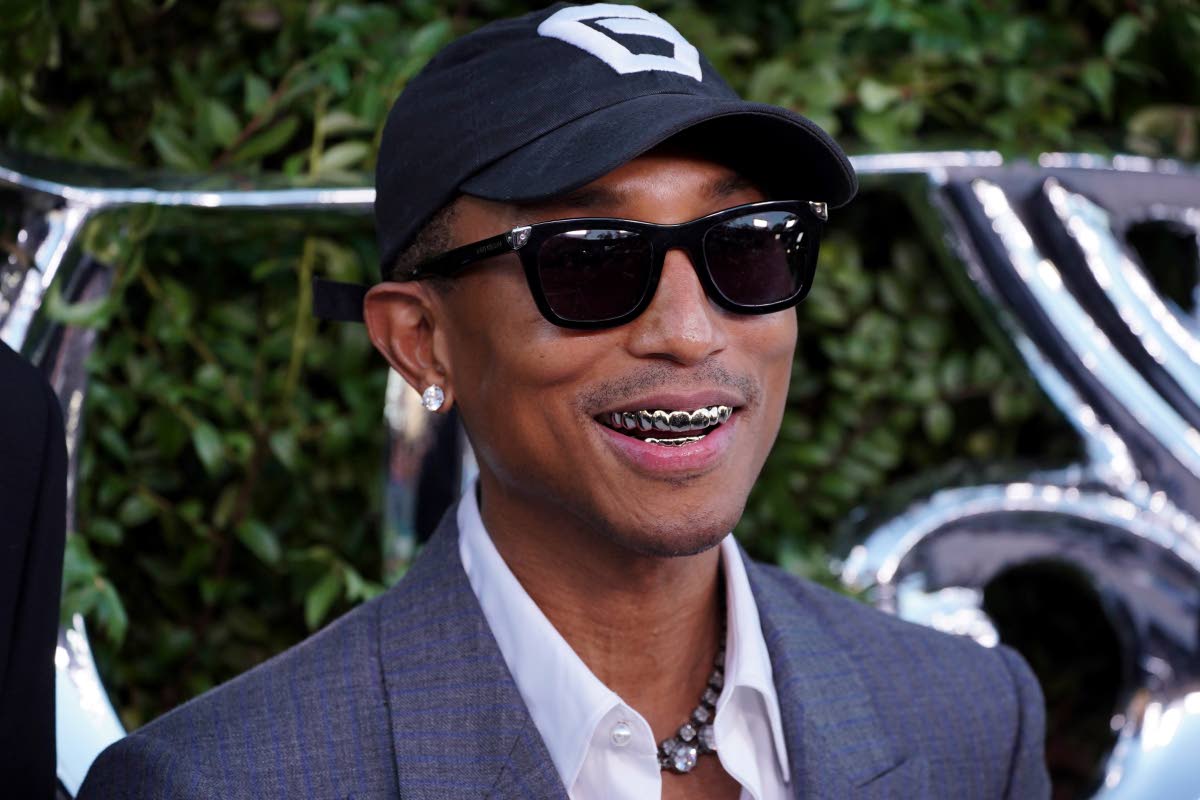 Opening-night co-chair Pharrell Williams brings his signature cool to the occasion.