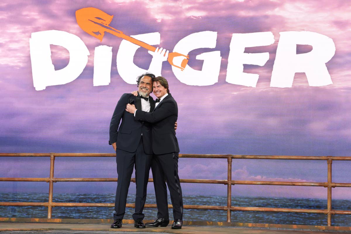 Director Alejandro G. Iñárritu (left) and ‘Digger’ star Tom Cruise pose for photographers at the film’s world premiere in London.