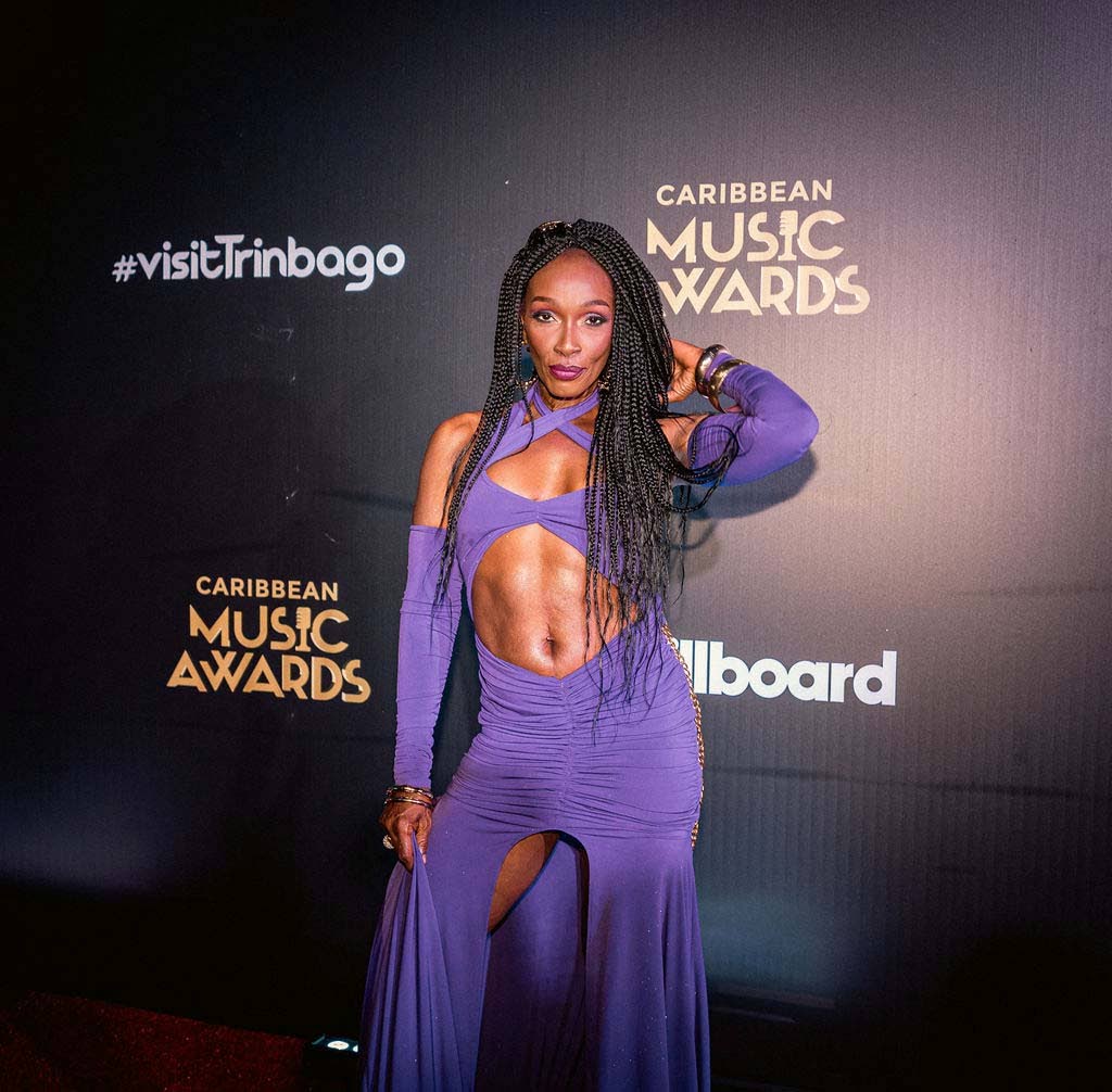 ‘Queen of the Pack’ Patra turns heads in a custom purple Butch Diva look by Tiffany Rhodes.