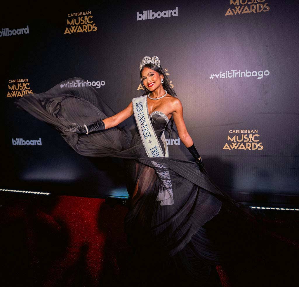 Recently crowned Miss Universe Trinidad and Tobago Vinita Manoo makes an entrance in a dramatic Sherri Hill gown from Kootis.