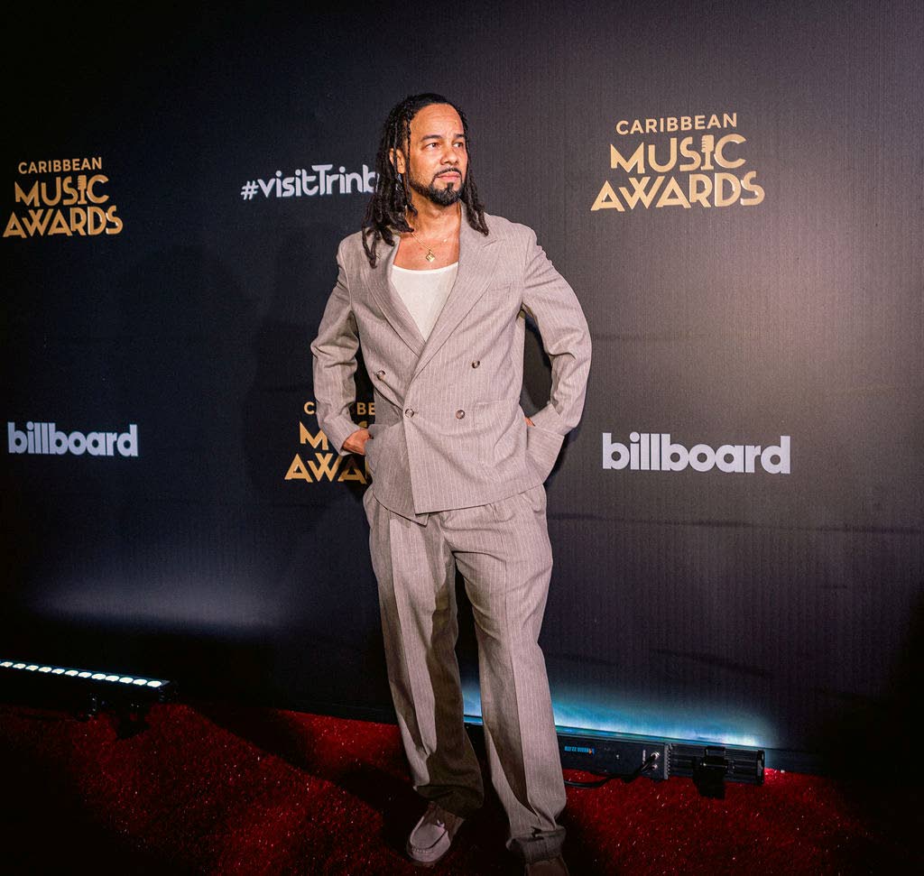 Kees Dieffenthaller, Male Soca Artiste of the Year and Soca Performer of the Year, cuts a striking figure in an oversized double-breasted suit.