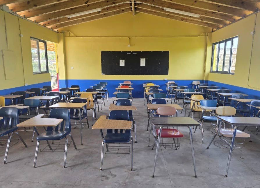 Reclaimed and donated furniture  shipped to a western Jamaica school and that are in use in classrooms that were renovated after Hurricane Melissa.