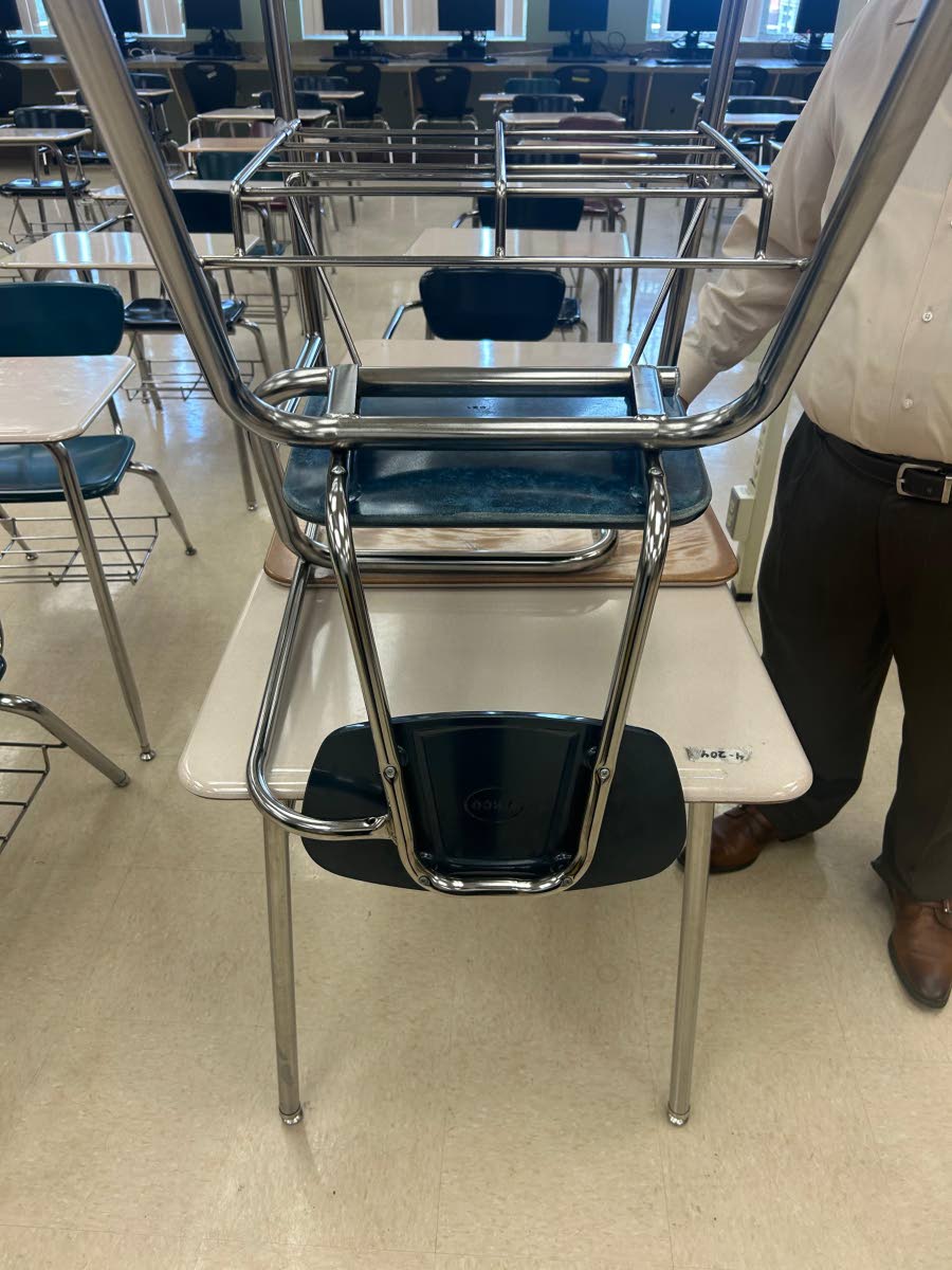 Reclaimed and donated furniture  shipped to a western Jamaica school and that are in use in classrooms that were renovated after Hurricane Melissa.