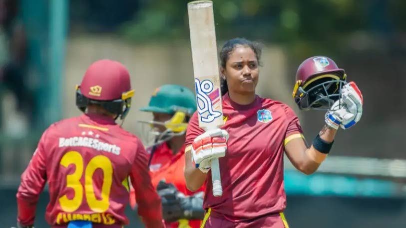 West Indies Women’s captain Hayley Matthews (right) celebrates after scoring her 13th ODI century against Zimbabwe.