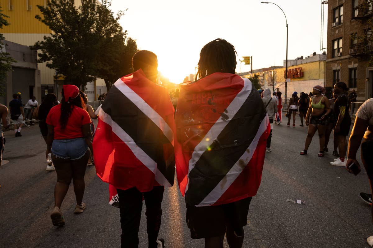  People with Trinidad and Tobago flag are seen during J’ouvert celebration on September 4, 2023, in the Brooklyn borough of New York.