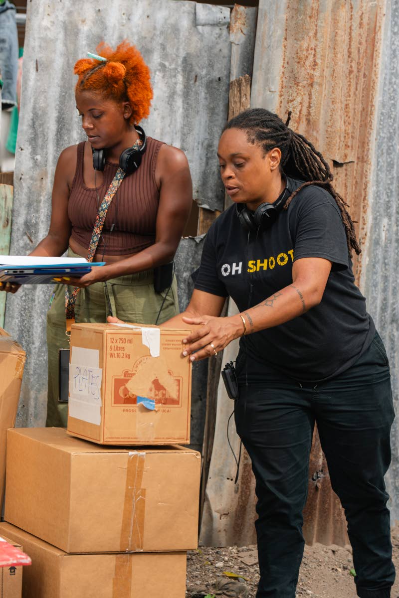 Script Supervisor Kalia Ellis (left) and Wanliss on set. 