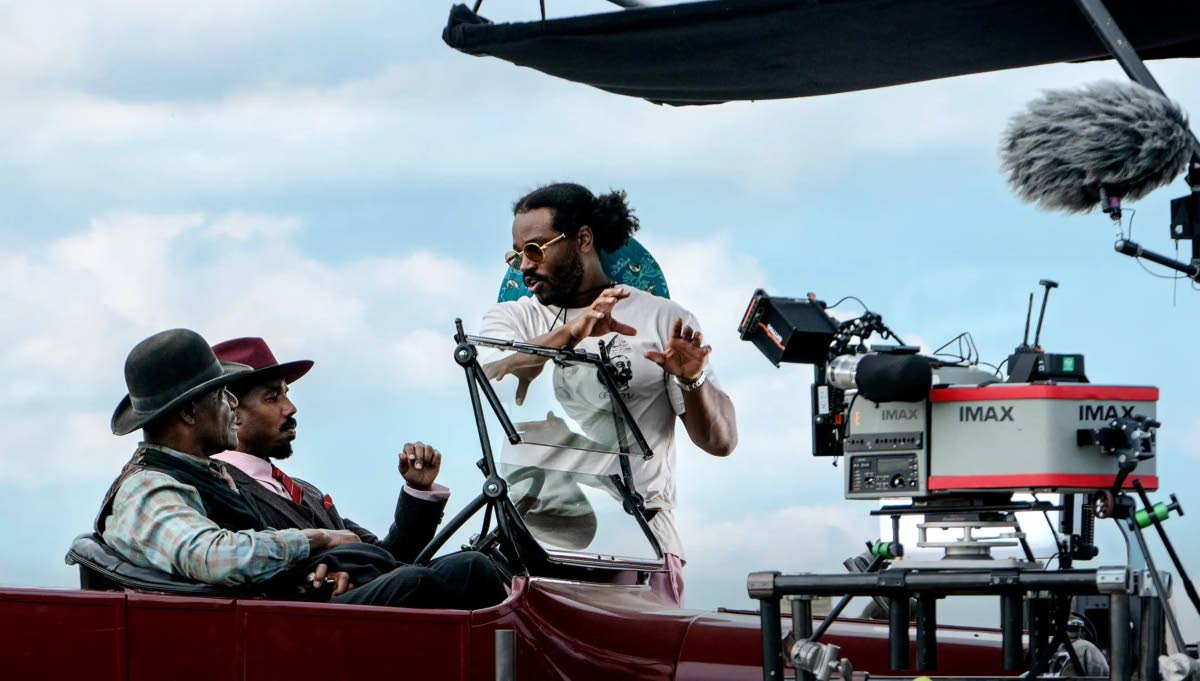 Eli Ade for Warner Brothers 
‘Sinners’ helmer Ryan Coogler (right) – who won the 2026 Academy Award for Best Original Screenplay – giving directions to his stars Michael B. Jordan (centre) and Delroy Lindo during the movie’s filming in Louisiana,