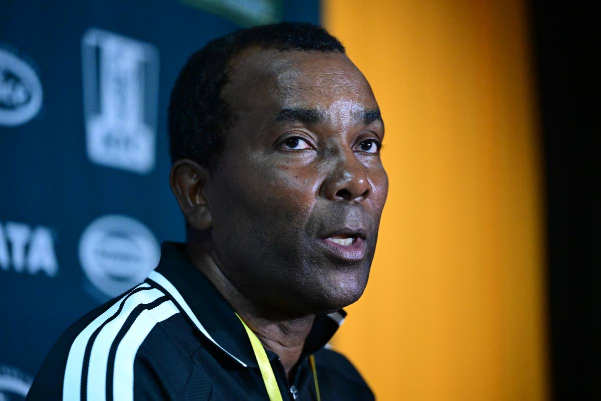 Regae Boyz coach Rudolph Speid speaks to media after a Concacaf Nations League game against Guatemala at the National Stadium on Friday night.
