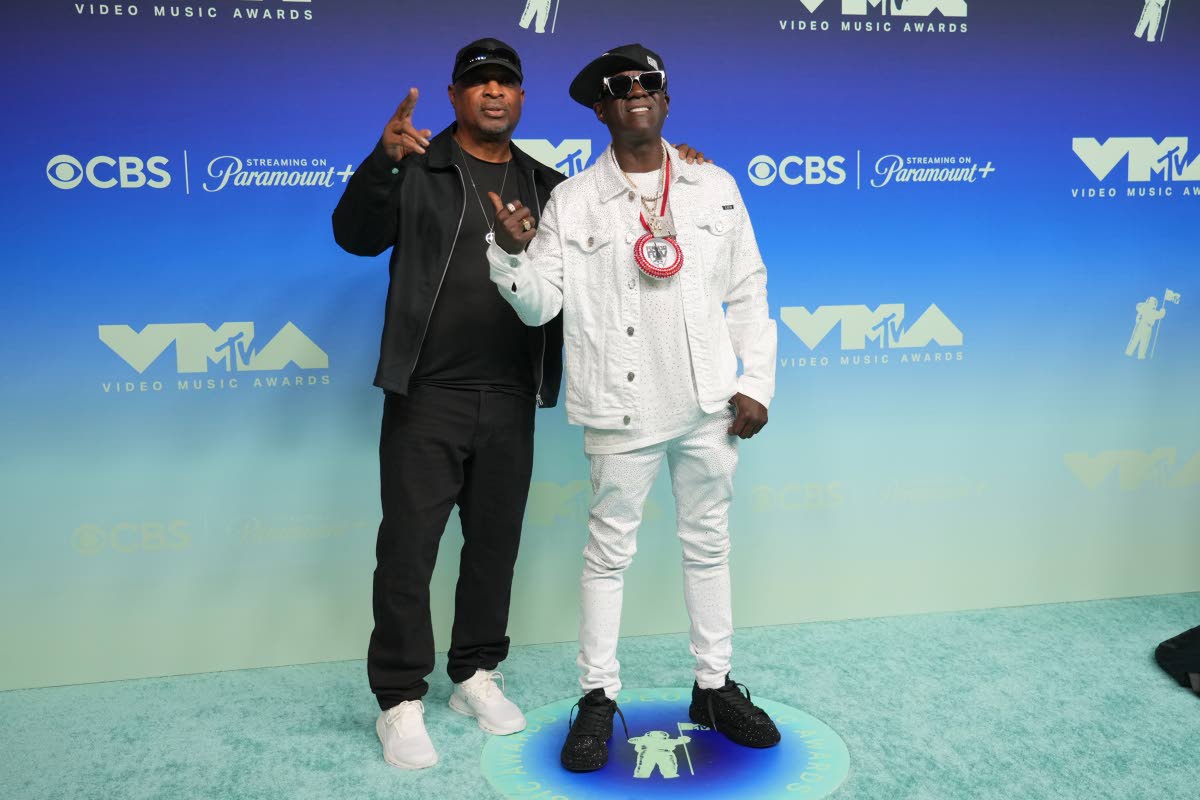 Chuck D (left) and Flavor Flav arrive with good vibes.