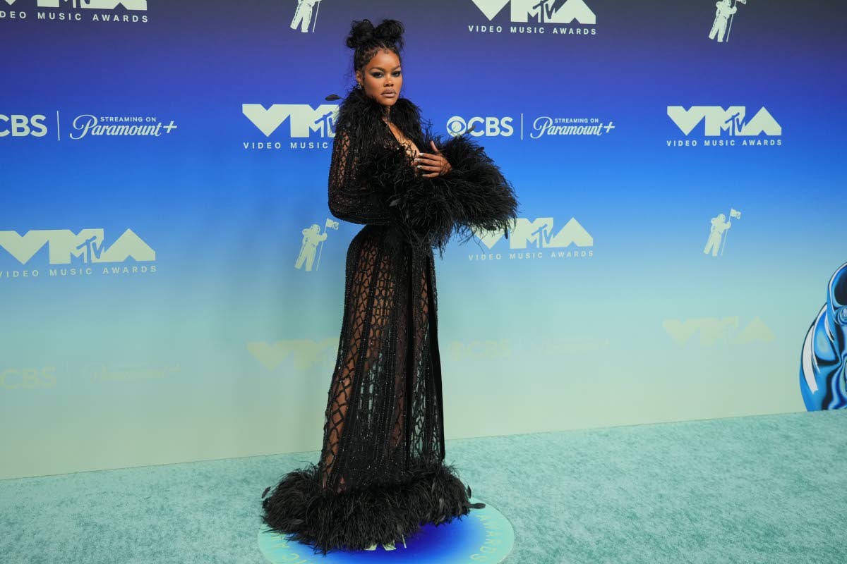 Teyana Taylor steps out in floor-sweeping, sheer Zuhair Murad Couture lace.