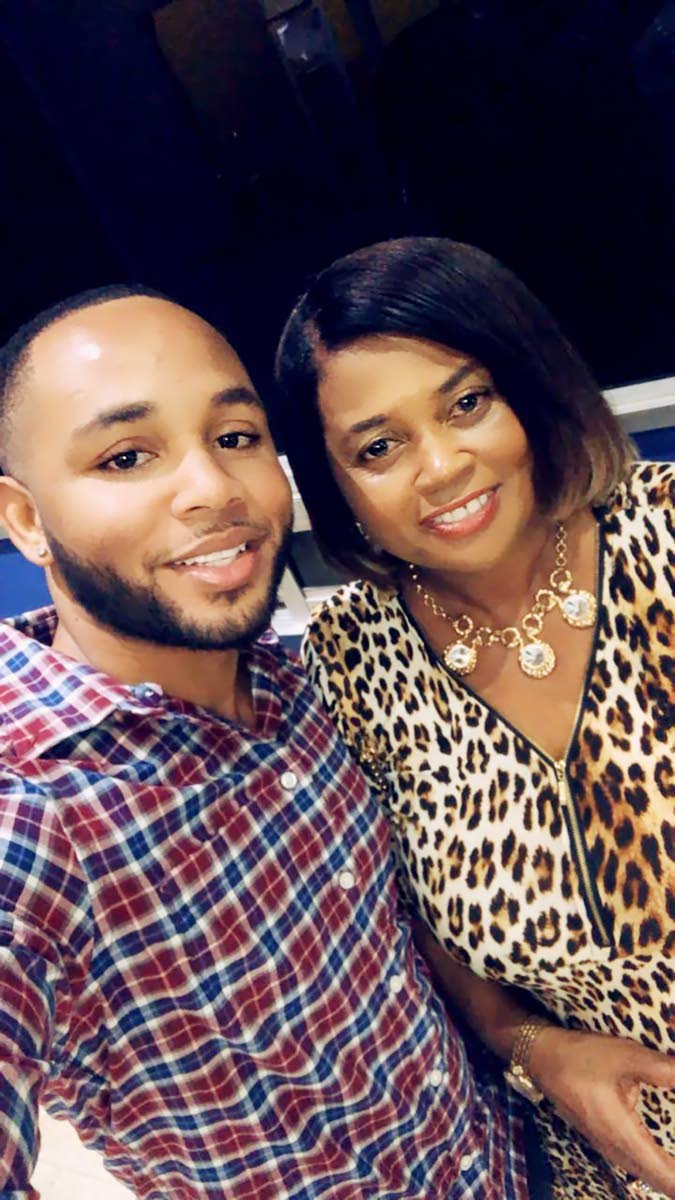 Dr Marco-Dean Brown shares a cherished moment with his late mother, Donna-Marie Erskine, who remained a constant source of encouragement throughout his doctoral journey.