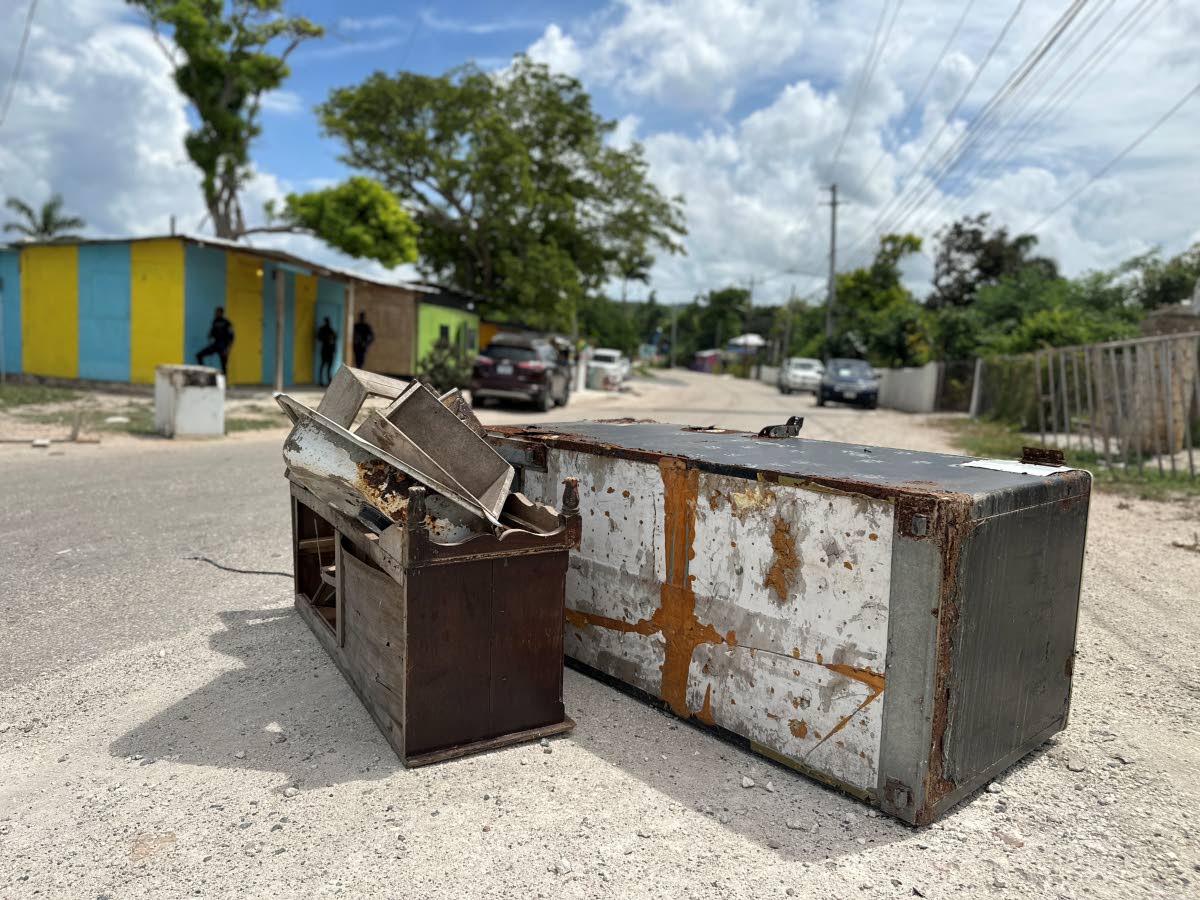 Some of the debris that was used by residents of Coopers Pen, Trelawny to block the road during their protest action yesterday.