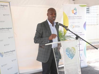 Donor and philanthropist Branatic Neufville giving remarks during the handover ceremony at May Pen Hospital on Thursday, July 16.