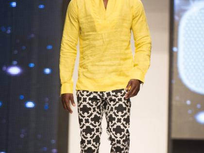 In this March 2014 photo, a model walks the runway in a creation by Designs by Marc Limited.