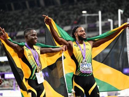 Jamaica's Oblique Seville (left) and Kishane Thompson celebrate their one-two finish in the men's 100 metres final at the World Athletics Championships at Japan National Stadium in Tokyo.