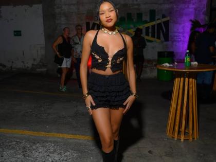 From the glint of silver pins to the flow of ruffled shorts, costume and production designer Anna-Lisa Guthrie owns the scene in black thigh highs.