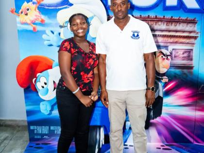 Principal of Siloah Primary School Oneil Larmond (right) with 12-year-old former student, Terriann Haye who was recently placed at St Elizabeth Technical High School. 