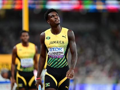 Jamaica's Delano Kennedy looks up at the clock after his leg of a men's 4x400-metre relay heat put his team in contention to qualify for the World Athletics Championship final at the Japan National Stadium. 