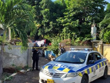 An unidentified man was fatally shot and a firearm and ammunition reportedly seized at a property in Hungry Town, off Mannings Hill Road, St Andrew.