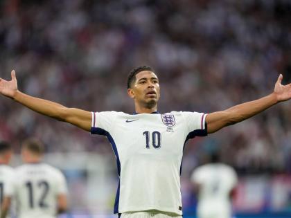 England’s Jude Bellingham celebrates after scoring the opening goal during a Euro 2024 Group C football match against Serbia in Gelsenkirchen, Germany, on June 16, 2024.