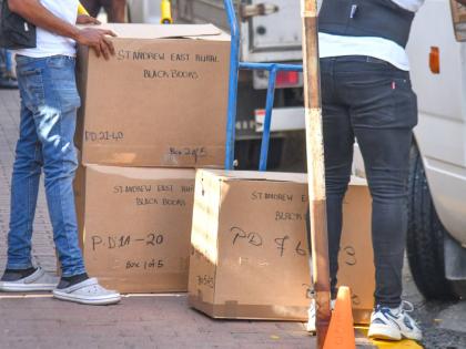 In this August photo, Electoral Office of Jamaica workers load ballot boxes in a bus ahead of the 2025 general election. 