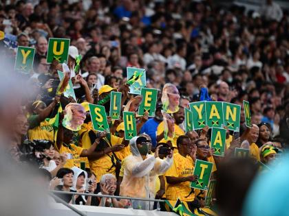 Jamaican track and field fans display signs that spell out Shelly-Ann Fraser-Pryce’s name in celebration of her international retirement after the women’s 4x100 metres at the World Athletics Championships in Tokyo, Japan, last month. Fraser-Pryce retir