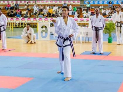 Contributed 
Sharic Bowen (centre) goes through his paces.