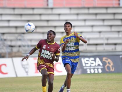 Maggotty High’s Dante Blair (left) and Rusea’s High’s Roshawn Dillion challenge for the ball during their Group One football match in the second round of the ISSA daCosta Cup at Montego Bay Sports Complex on Saturday, October 11.