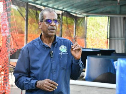 Chief Executive Officer of National Fisheries Authority (NFA), Dr Gavin Bellamy, converses with reporters during a tour of the NFA’s Bowden Bay Mariculture Research Facility in St Thomas where the Red Snapper Cage Culture Fin Fish Pilot Project is being 