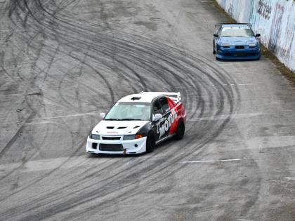 Sebastian Rae (left), driving his Mitsubishi Lancer 6 1/2 Tommi Mäkinen Edition during Heroes of Speed at the Dover Raceway in St Ann on Monday.