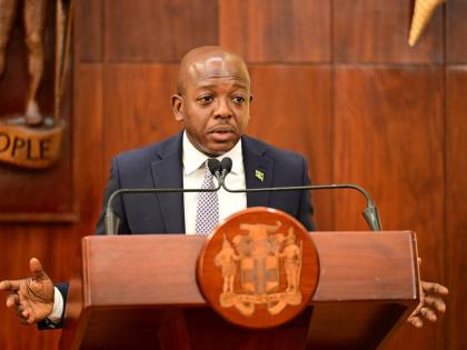Minister of Labour and Social Security, Hon. Pearnel Charles Jr, addresses a special press briefing on preparations for Tropical Storm Melissa at the Office of the Prime Minister in Kingston on Wednesday.