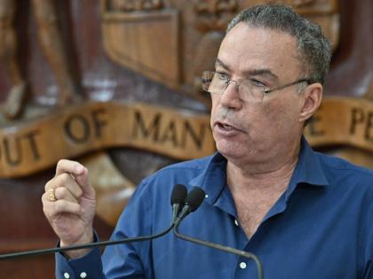 Transport Minister Daryl Vaz speaking at a special press briefing at the Office of the Prime Minister in St Andrew on October 23.