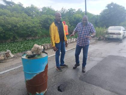 Member of Parliament for St Catherine South Eastern, Dr Alfred Dawes (left) and Councillor for the Waterford Division Fenley Douglas during a visit to the community of Waterford ahead of the passing of Tropical Storm Melissa.