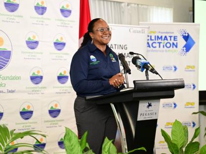 Jamaica Urban Solutions for the Environment Project Manager Joni Jackson addresses the initiative’s launch at The Jamaica Pegasus hotel in New Kingston on Thursday.