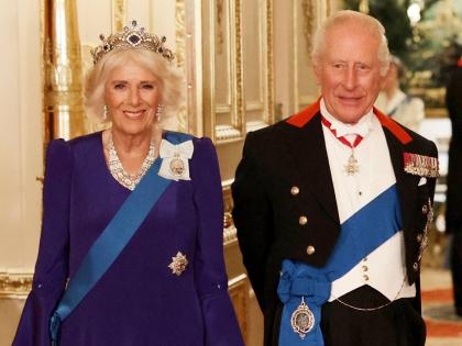 Britain’s Queen Camilla (left) and King Charles III (right) pose for a photo before a State Banquet at Windsor Castle, in Windsor, England.
