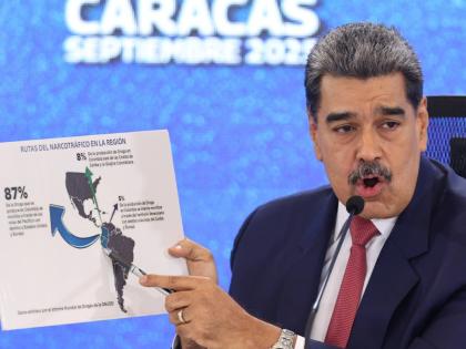 Venezuela's President Nicolas Maduro points at a map of the Americas during a new conference in Caracas, Venezuela on September 15, 2025. 

