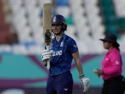 England’s Amy Jones celebrates after reaching 50 during the ICC Women’s World Cup match between England and New Zealand at ACA–VDCA Cricket Stadium in Visakhapatnam, India yesterday.