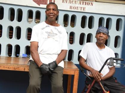  Jewham Davis Davis (left) and Trevor Barnes are two of the three persons presently staying in the shelter at the New Forest High School in Manchester on October 26, 2025. 