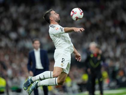 Real Madrid’s Dani Carvajal receives the ball during the La Liga football match between Real Madrid and Villareal in Madrid, Spain, on October 5, 2024. 