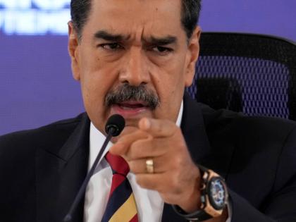 Venezuela President Nicolas Maduro speaks during a press conference in Caracas, Venezuela, Monday, September 1, 2025. (AP Photo/Ariana Cubillos)