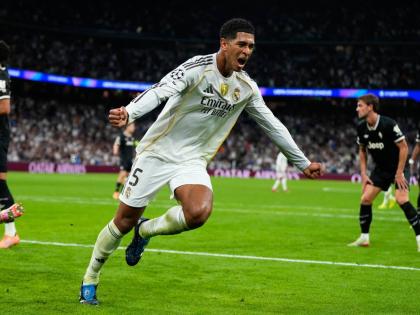 Real Madrid’s Jude Bellingham celebrates after scoring his side’s first goal during the Champions League opening phase match against Juventus in Madrid, Spain, on October 22.